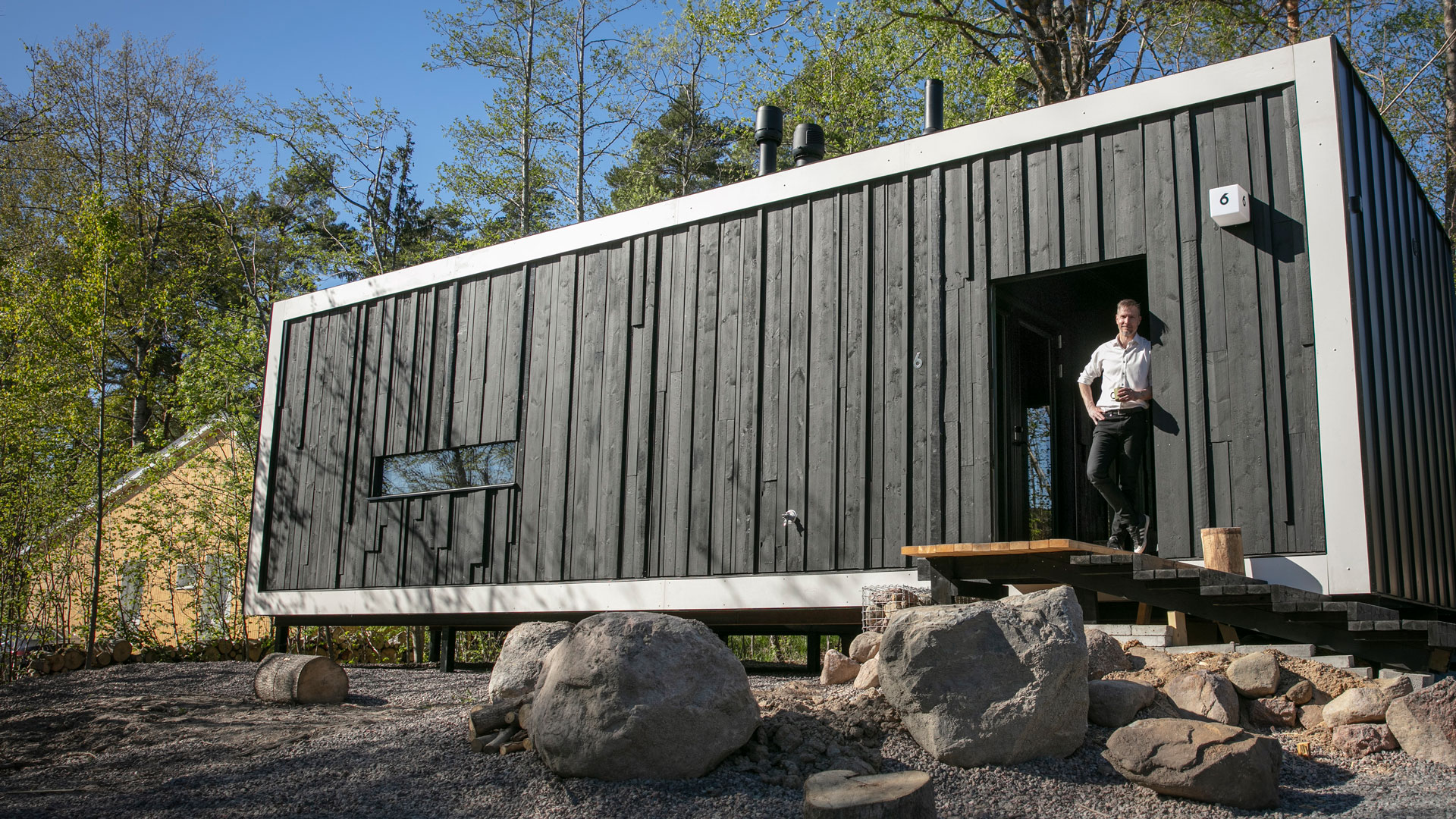 House Shadow with architect Matti Kuittinen outside