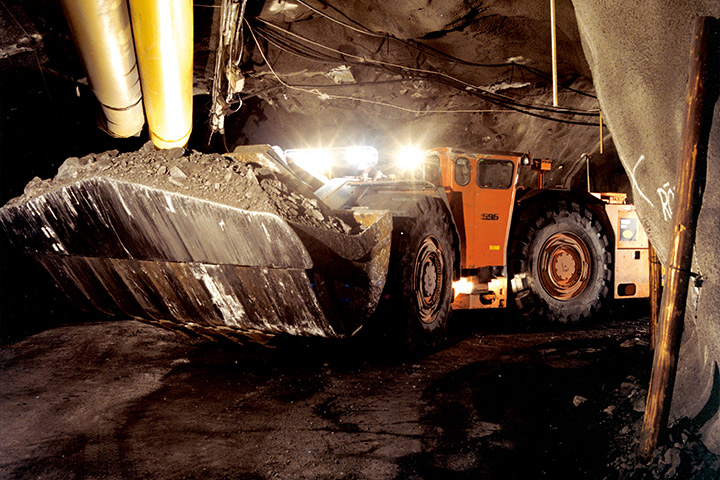 Underground mining truck carrying a heavy load