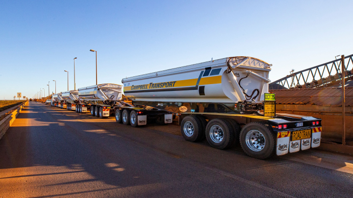 Mining trailers on the road, made by Australian Bruce Rock Engineering, with trailer bodies made in Hardox® HiAce steel to fight corrosion.