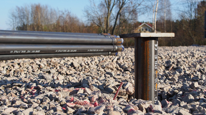 Steel pile and bearing plate